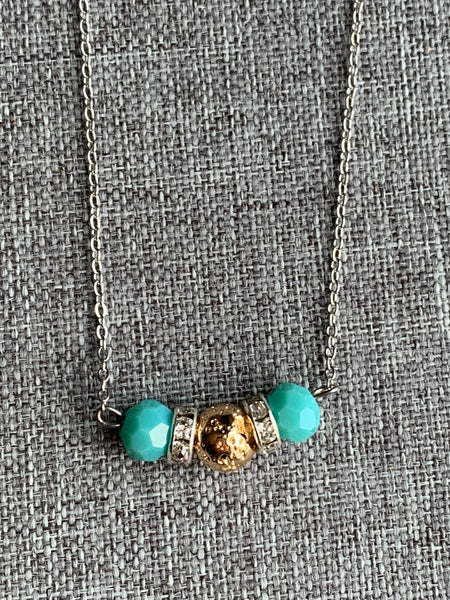 Collier pierre de lave ton or et billes turquoises  bijoux diffuseur