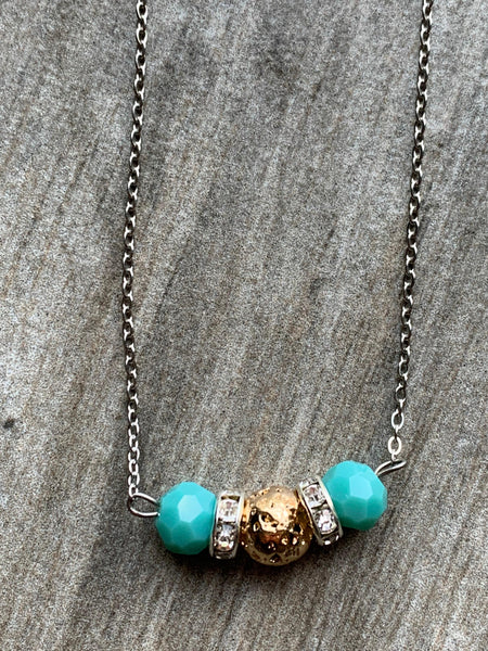 Collier pierre de lave ton or et billes turquoises  bijoux diffuseur Comme un ange