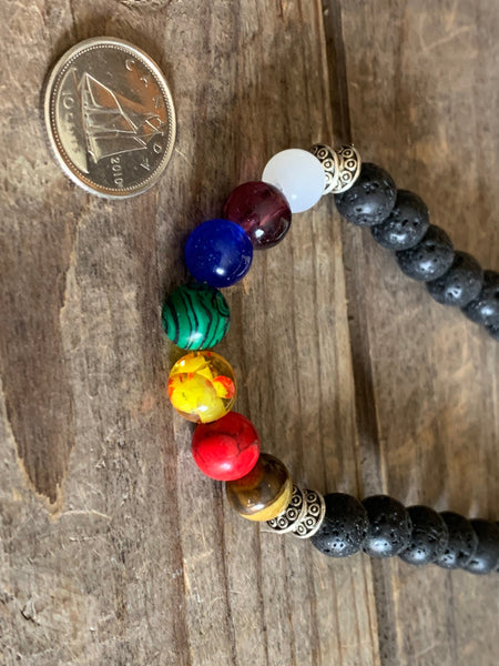 Collier  pierre de lave noire et billes multicolore  chakras bijoux zen Comme un ange