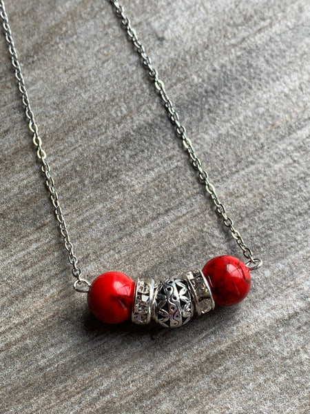 Collier rouge Comme un ange