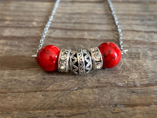 Collier rouge Comme un ange