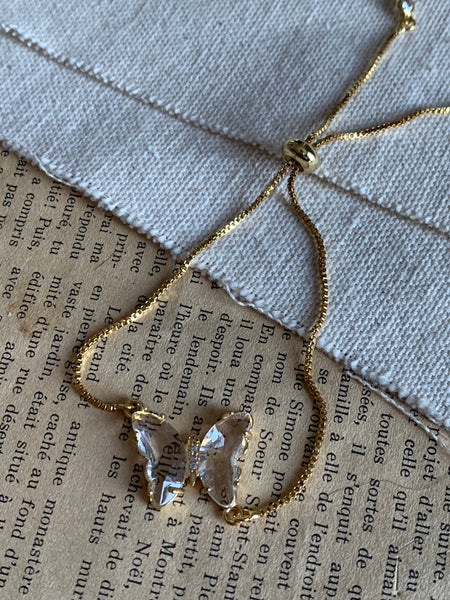 Bracelet ajustable alliage de métaux or breloque papillon pierre transparentes Comme un ange