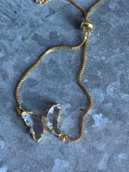 Bracelet ajustable alliage de métaux or breloque papillon pierre transparentes Comme un ange