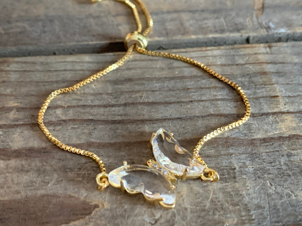 Bracelet ajustable alliage de métaux or breloque papillon pierre transparentes Comme un ange