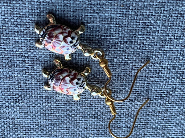 Boucles d’oreilles breloque tortue rouge Comme un ange