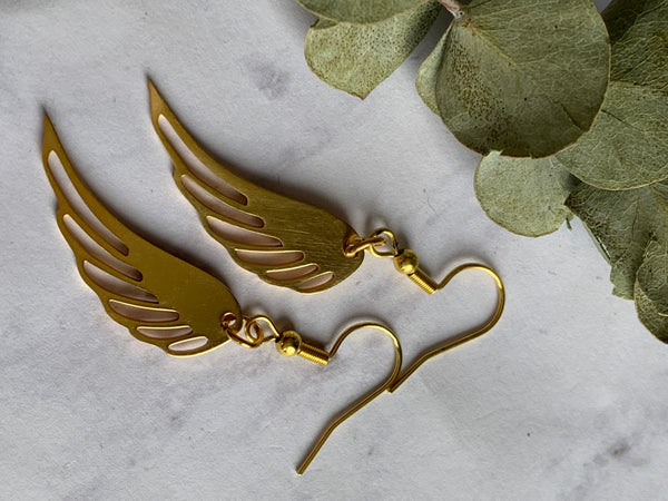 Boucles d’oreilles breloque plume d’ange alliage de métaux or Comme un ange