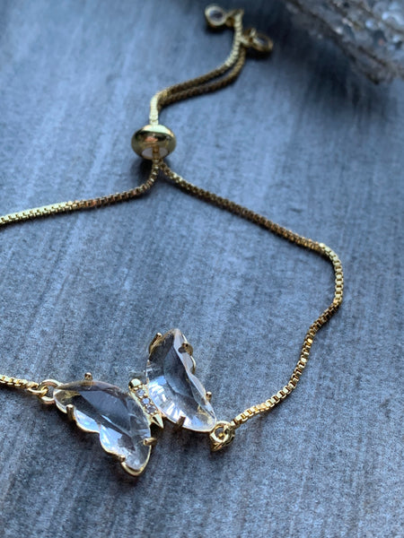 Bracelet ajustable alliage de métaux or breloque papillon pierre transparentes Comme un ange