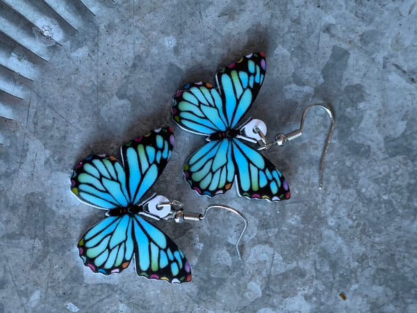 Boucles d’oreilles breloque papillon bleu sur crochet alliage de métaux argent Comme un ange
