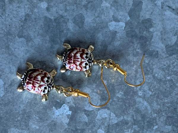 Boucles d’oreilles breloque tortue rouge Comme un ange