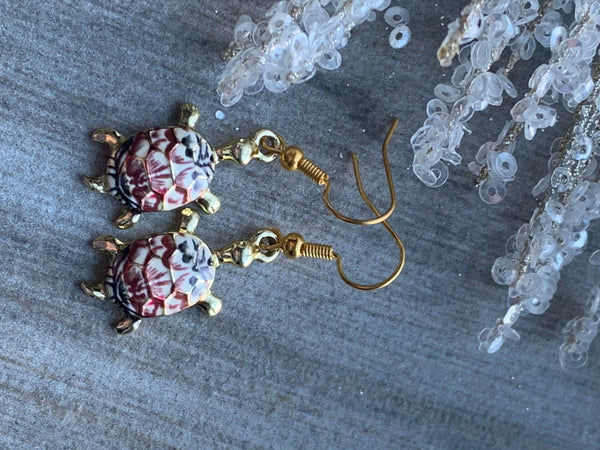 Boucles d’oreilles breloque tortue rouge Comme un ange