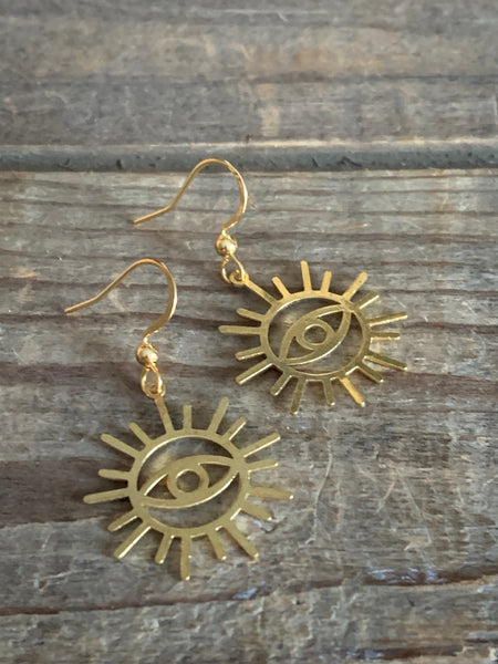 Boucles d’oreilles breloque œil soleil or Comme un ange