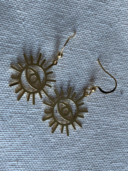 Boucles d’oreilles breloque œil soleil or Comme un ange