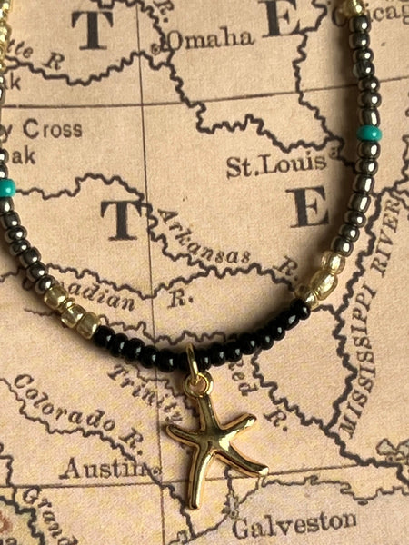 Collier petites billes étoile dorée Comme un ange
