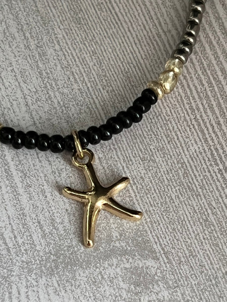 Collier petites billes étoile dorée Comme un ange
