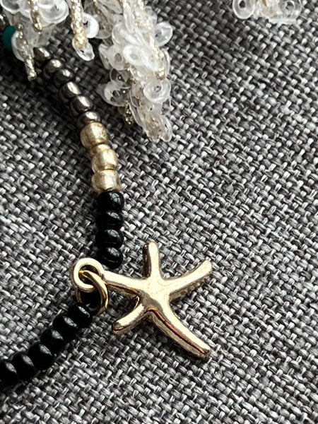 Collier petites billes étoile dorée Comme un ange