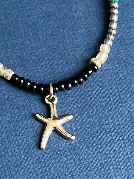 Collier petites billes étoile dorée Comme un ange