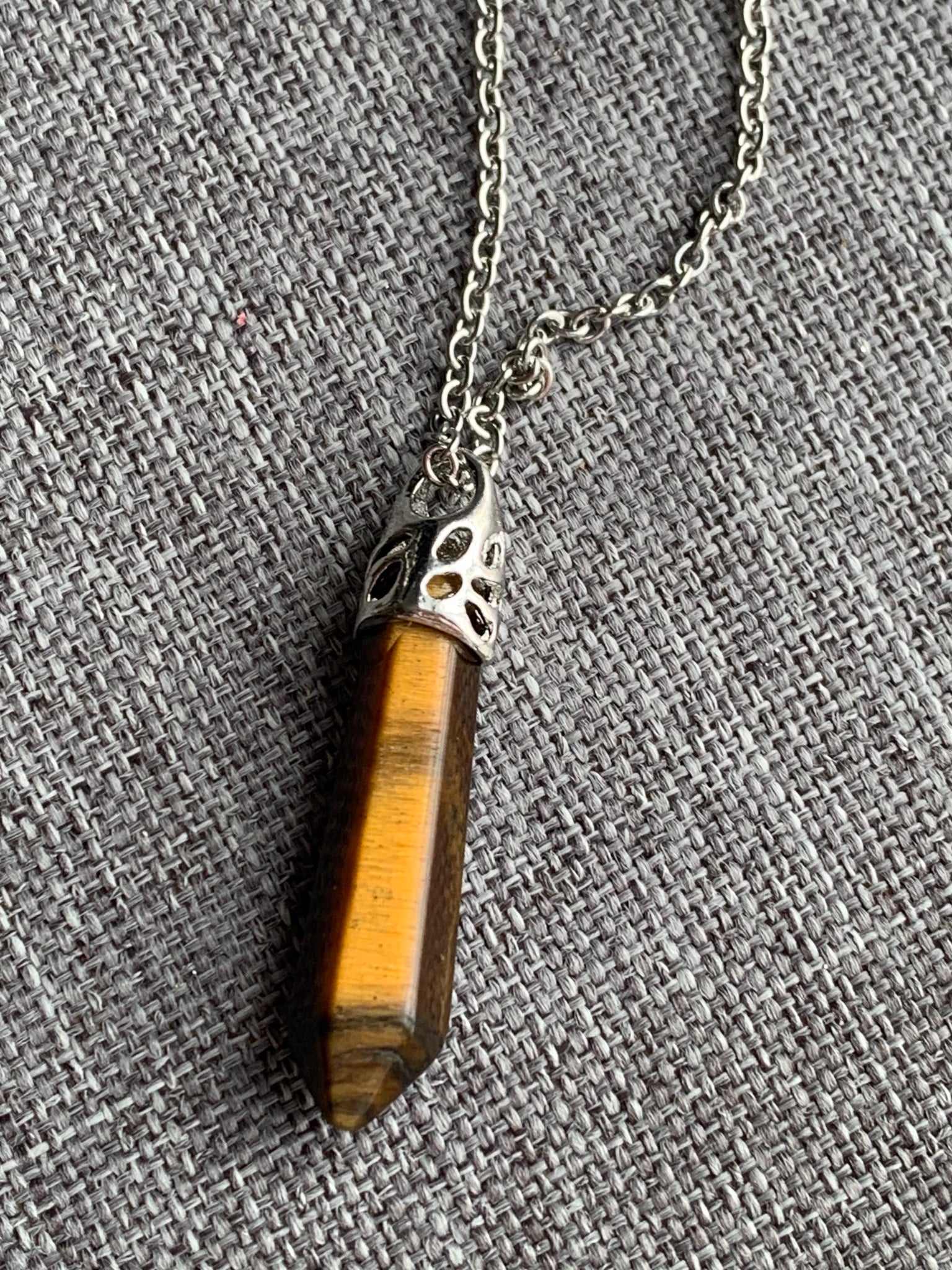 Collier pendule œil de tigre Comme un ange
