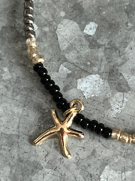 Collier petites billes étoile dorée Comme un ange