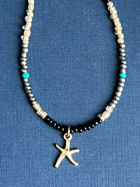 Collier petites billes étoile dorée Comme un ange