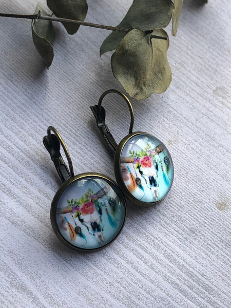 Boucles oreilles cabochon tête de buffles Comme un ange