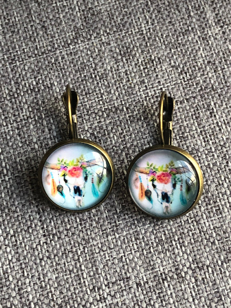 Boucles oreilles cabochon tête de buffles Comme un ange