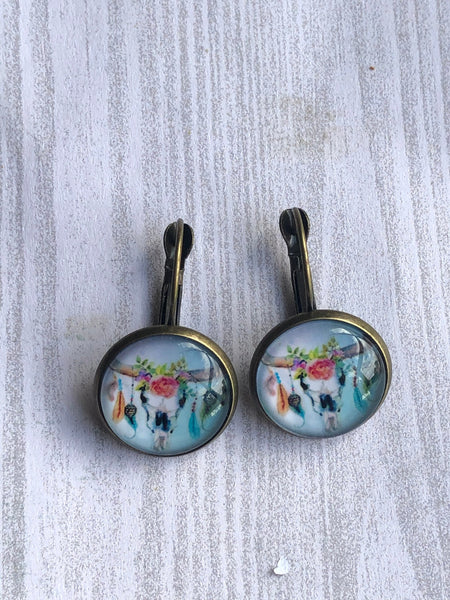 Boucles oreilles cabochon tête de buffles Comme un ange