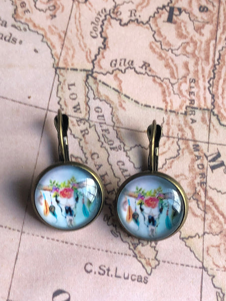Boucles oreilles cabochon tête de buffles Comme un ange