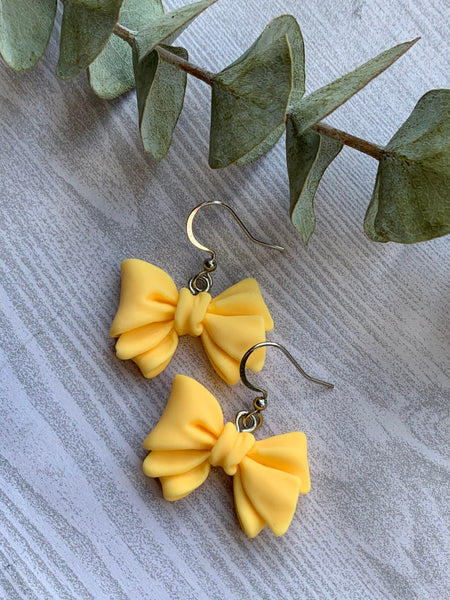 Boucles d’oreilles breloque boucles jaunes Comme un ange