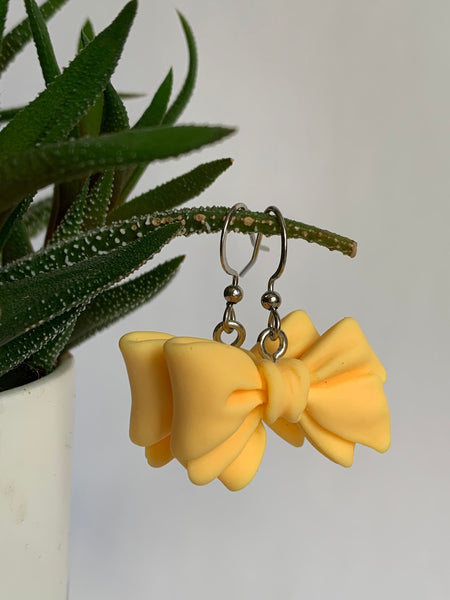 Boucles d’oreilles breloque boucles jaunes Comme un ange