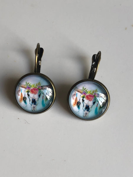 Boucles oreilles cabochon tête de buffles Comme un ange