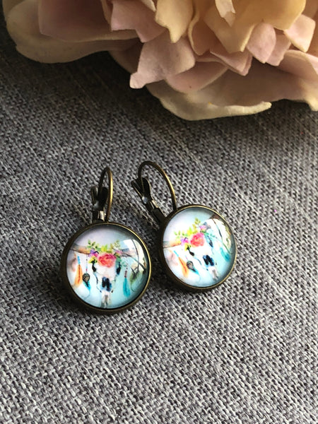 Boucles oreilles cabochon tête de buffles Comme un ange