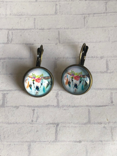 Boucles oreilles cabochon tête de buffles Comme un ange