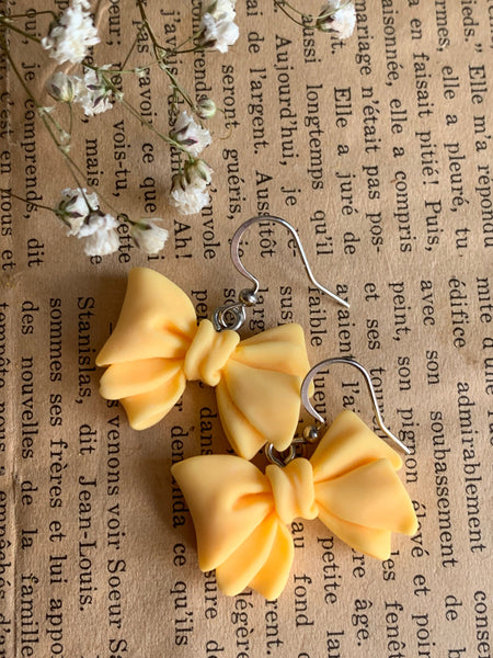 Boucles d’oreilles breloque boucles jaunes Comme un ange