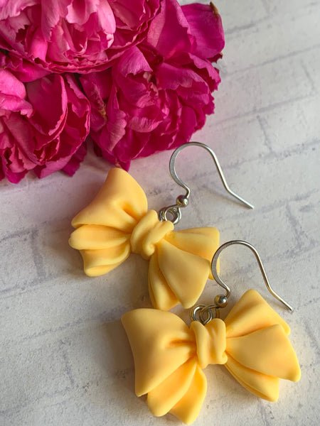 Boucles d’oreilles breloque boucles jaunes Comme un ange
