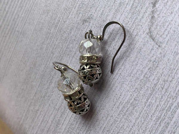 Boucles d’oreilles bille de verre transparentesur bille a motifs alliage de métaux argent Comme un ange