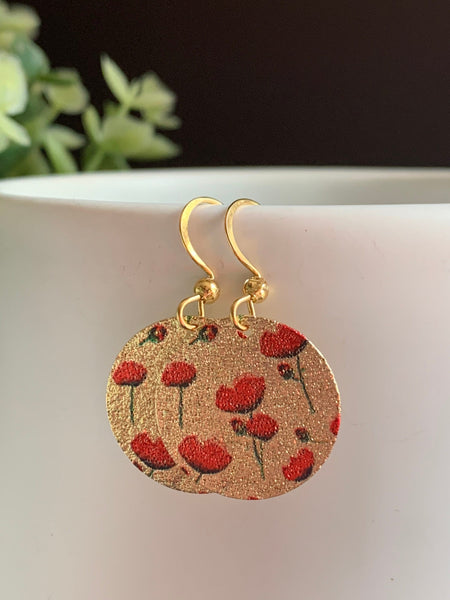 Boucles d’oreilles breloque médaillon or fleur rouge Comme un ange