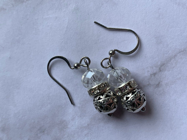 Boucles d’oreilles bille de verre transparentesur bille a motifs alliage de métaux argent Comme un ange