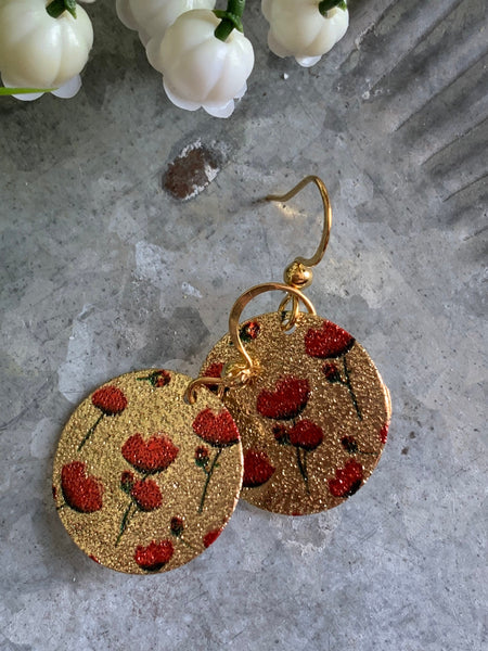 Boucles d’oreilles breloque médaillon or fleur rouge Comme un ange