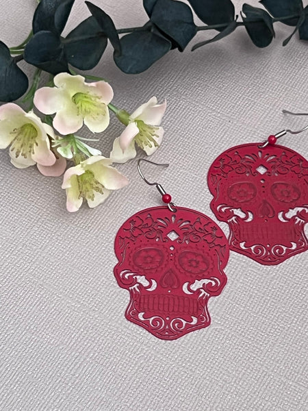 Boucles d’oreilles breloque tête de squelette rouge alliage de métaux skull JEWELRY Comme un ange