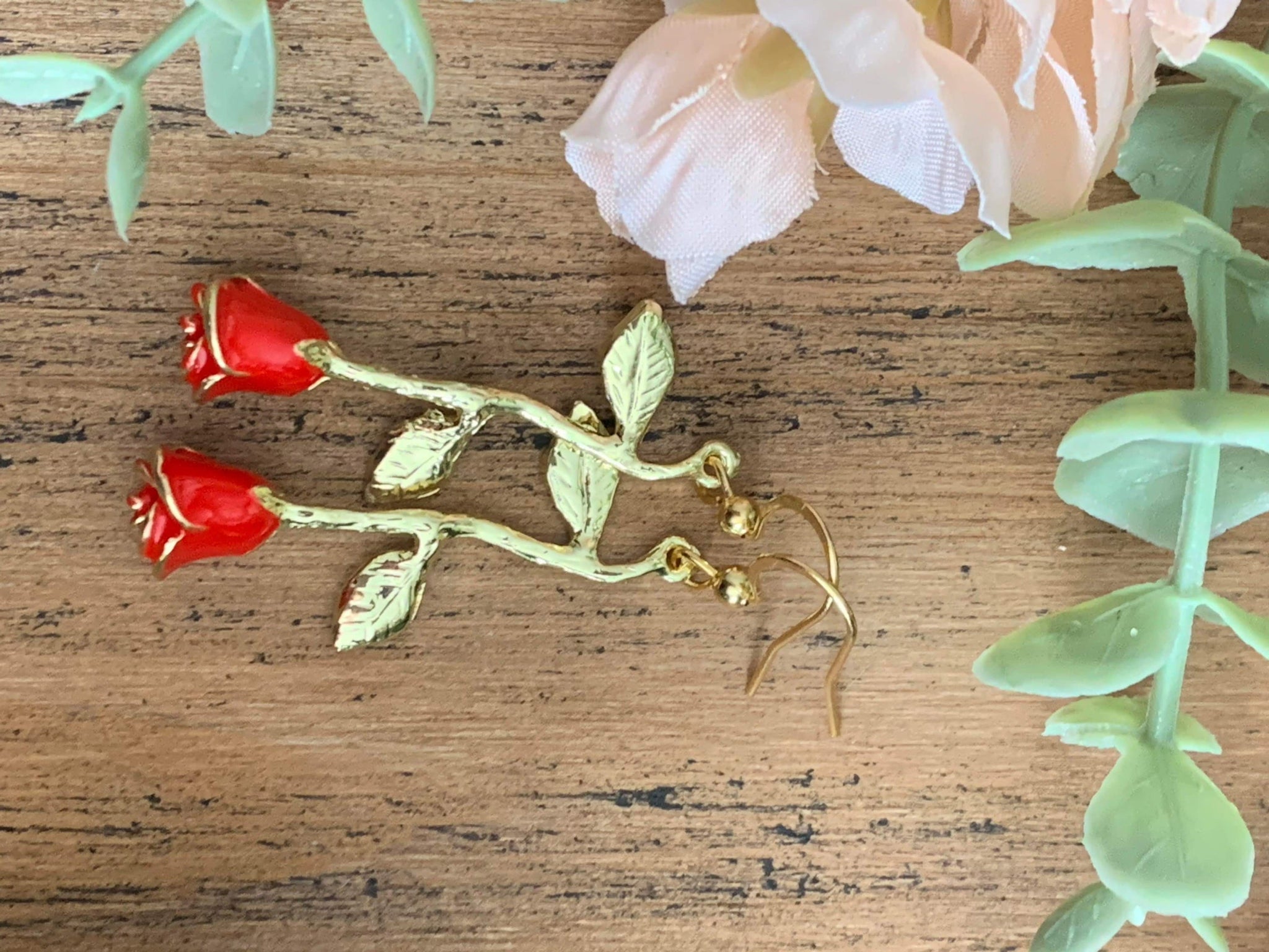 Boucles oreilles roses rouges