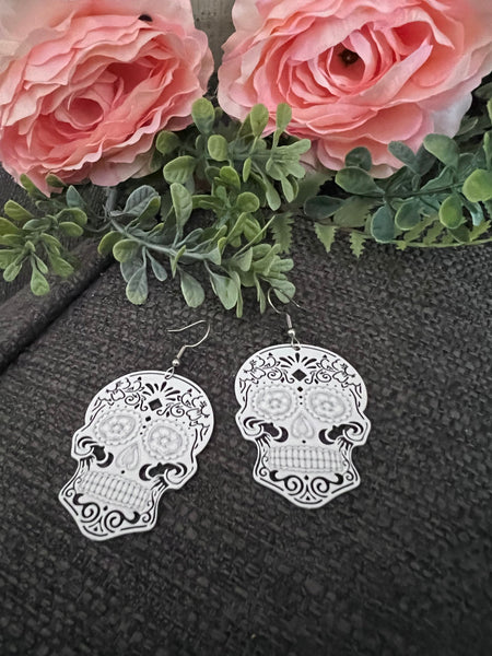 Boucles oreilles tête de squelette blanche Comme un ange