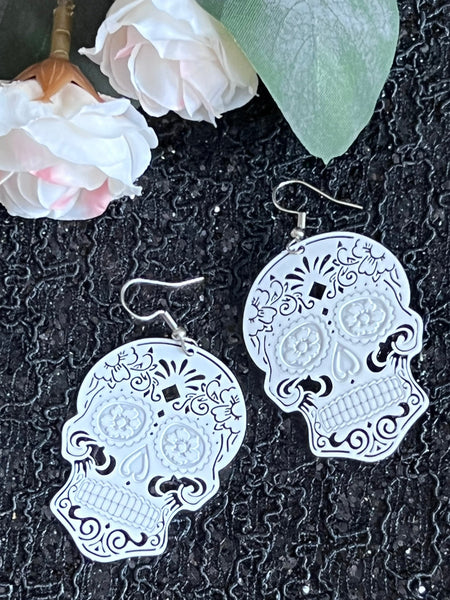 Boucles oreilles tête de squelette blanche Comme un ange