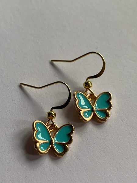 Boucles d’oreilles Petit papillon bleu poudre Comme un ange