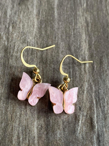 Boucles d’oreilles Petit papillon rose pâle Comme un ange