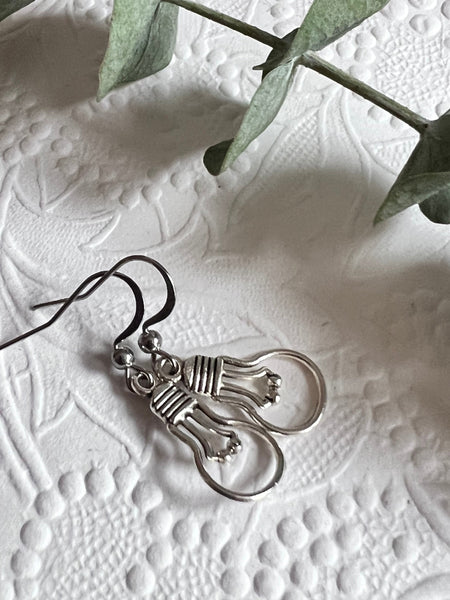 Boucles d’oreilles breloque ampoule idée alliage de métaux argent Comme un ange