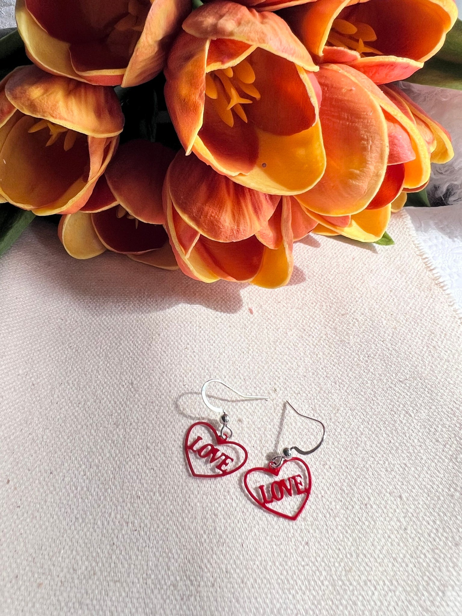 Boucles oreilles coeurs love rouge Comme un ange