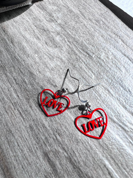 Boucles oreilles coeurs love rouge Comme un ange