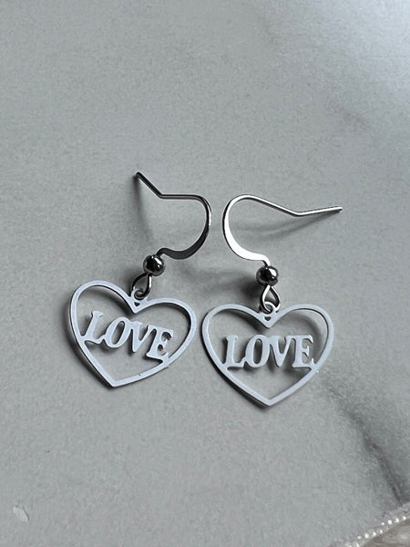 Boucles oreilles coeurs love blanches Comme un ange
