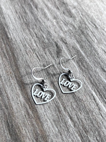 Boucles oreilles coeurs love blanches Comme un ange