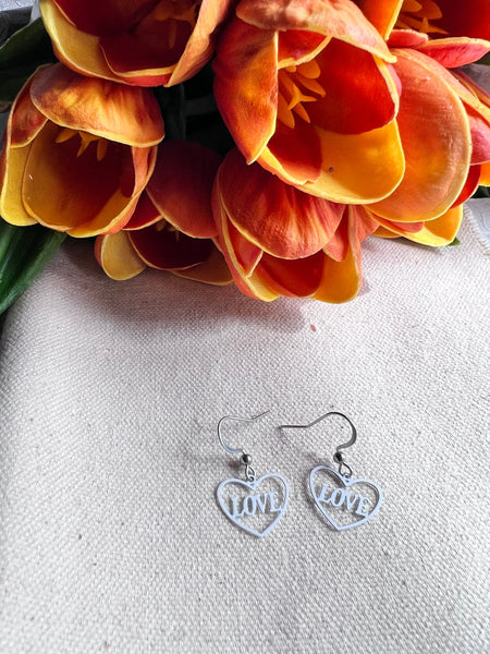 Boucles oreilles coeurs love blanches Comme un ange